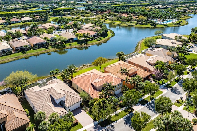 birds eye view of property with a residential view and a water view