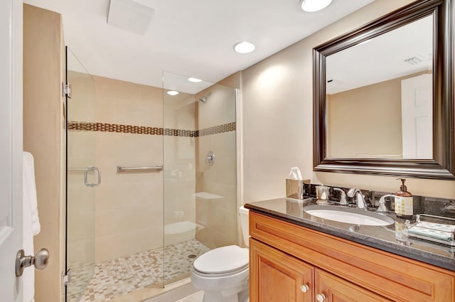 full bath with recessed lighting, visible vents, toilet, a stall shower, and vanity