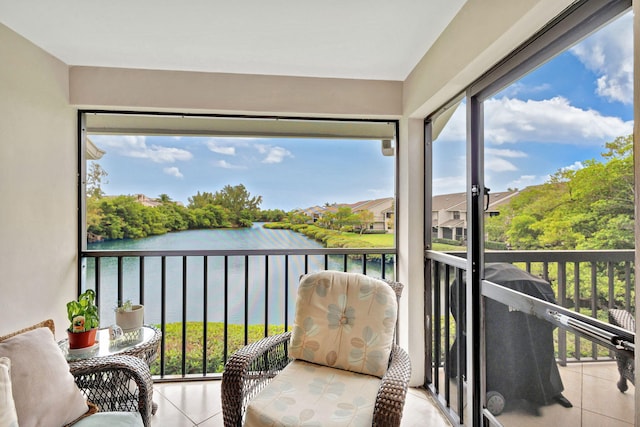 sunroom with a water view