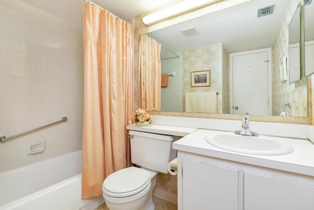 full bathroom featuring shower / bathtub combination with curtain, vanity, and toilet