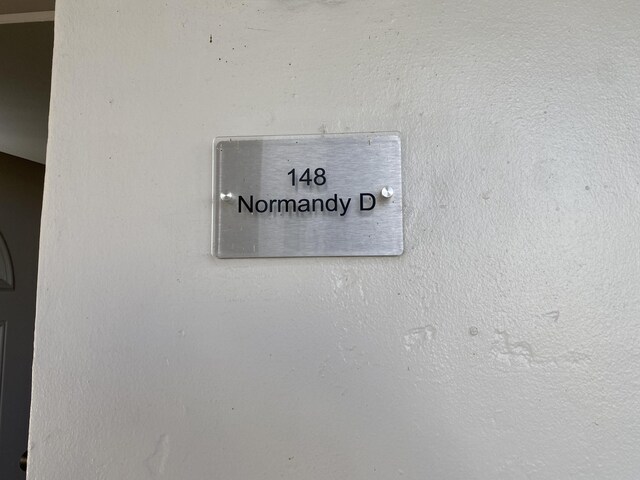 148 Normandy D Ln Unit D, Delray Beach, FL 33484 - property entrance with stucco siding