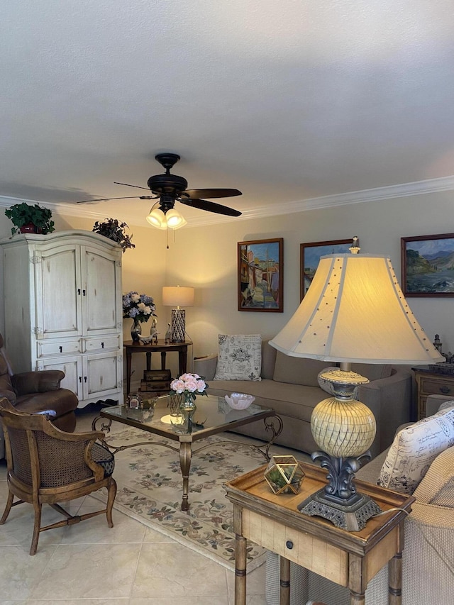 tiled living room featuring ornamental molding and ceiling fan