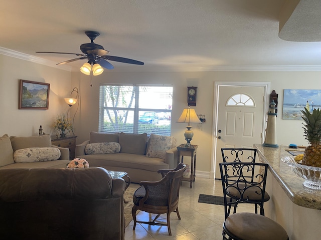 tiled living room with crown molding, a textured ceiling, and ceiling fan