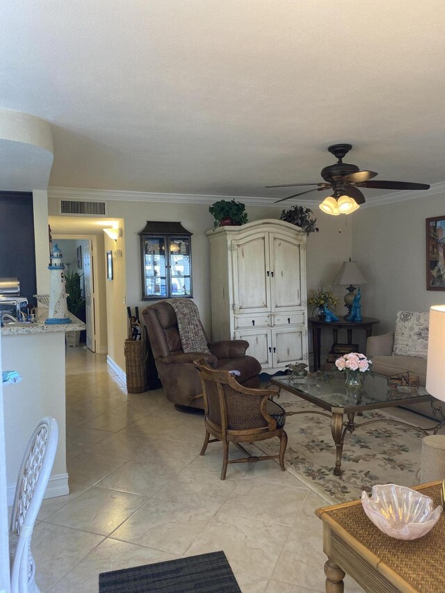 148 Normandy D Ln Unit D, Delray Beach, FL 33484 - living room featuring light tile patterned floors, ceiling fan, and ornamental molding