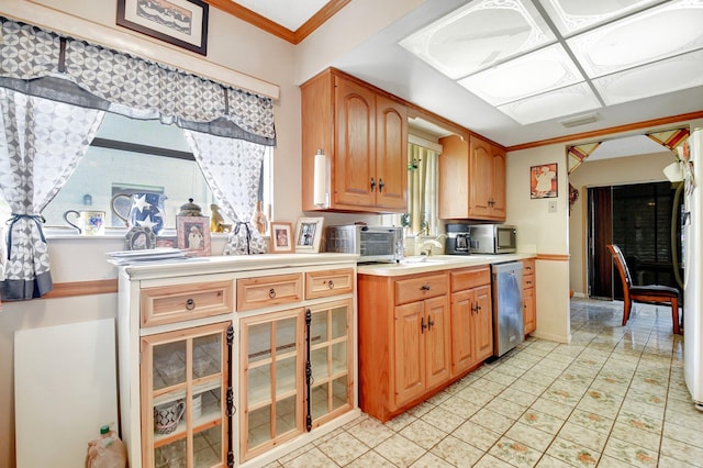 kitchen with crown molding and stainless steel appliances