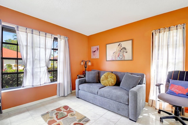 living room featuring light tile patterned flooring