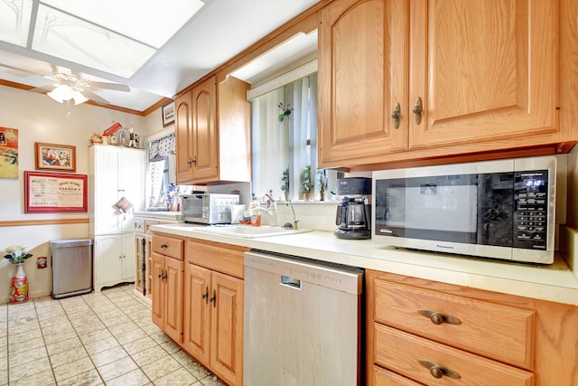 kitchen featuring sink, tasteful backsplash, light tile patterned floors, dishwasher, and ceiling fan