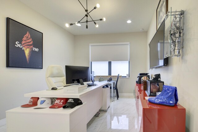 home office featuring an inviting chandelier