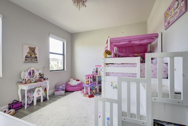 bedroom with hardwood / wood-style flooring