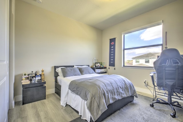 bedroom featuring light hardwood / wood-style flooring