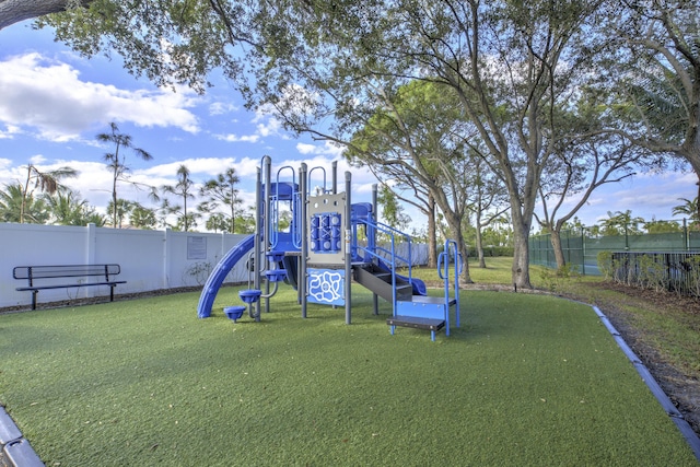 view of jungle gym featuring a yard