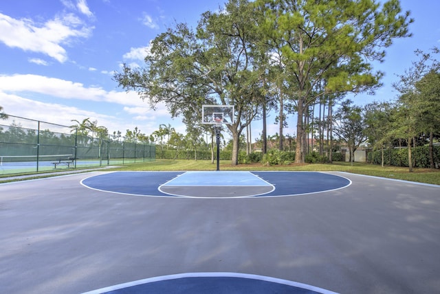 view of basketball court with tennis court