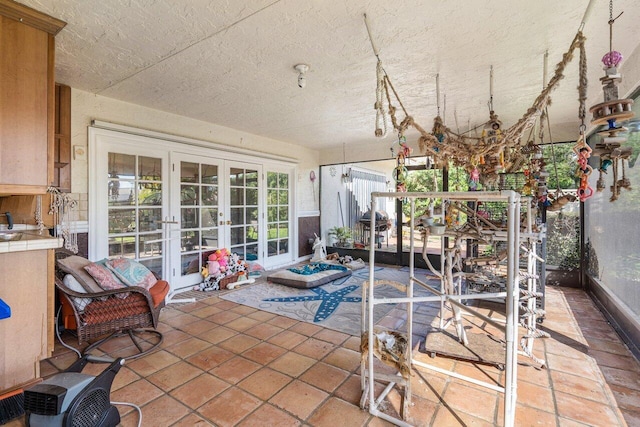 sunroom / solarium with french doors