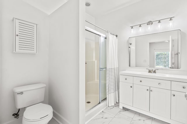 bathroom with marble finish floor, toilet, a stall shower, vanity, and baseboards