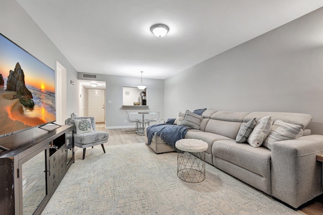 living room with light wood-type flooring