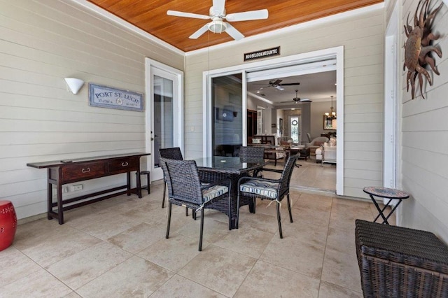 view of patio featuring ceiling fan