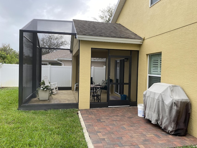 view of patio / terrace featuring area for grilling and fence