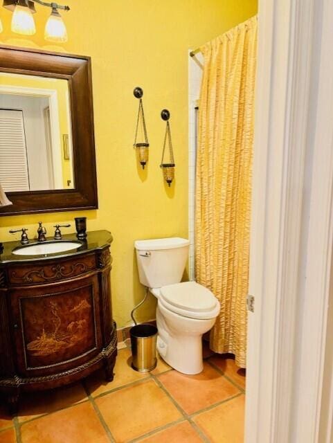 22663 Meridiana Dr, Boca Raton, FL 33433 - full bathroom with vanity, baseboards, tile patterned flooring, curtained shower, and toilet