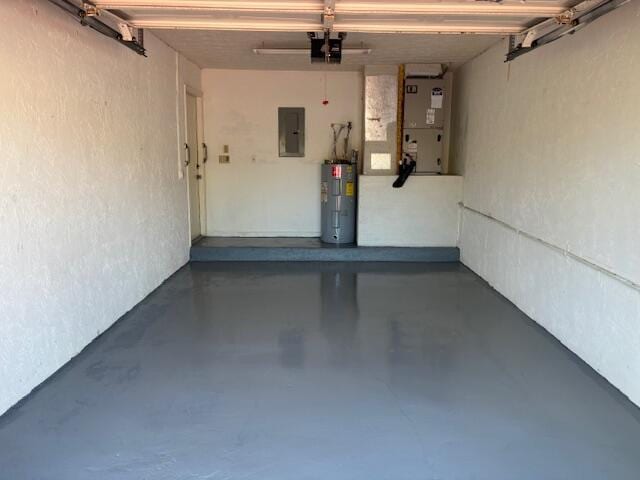 22663 Meridiana Dr, Boca Raton, FL 33433 - garage with electric water heater, electric panel, a garage door opener, a textured wall, and heating unit