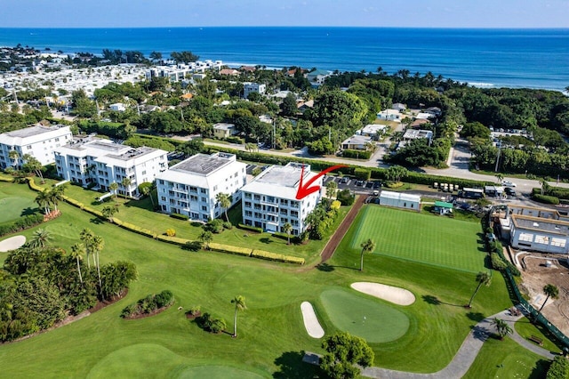 aerial view with a water view and golf course view