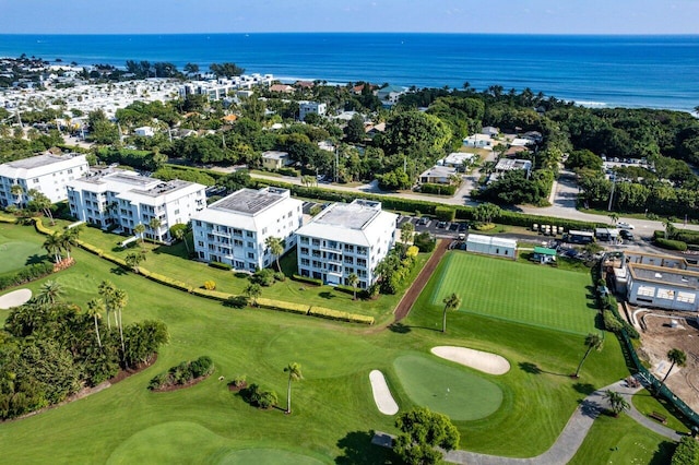 bird's eye view with view of golf course and a water view