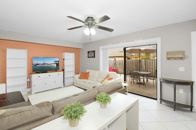 tiled living room featuring ceiling fan