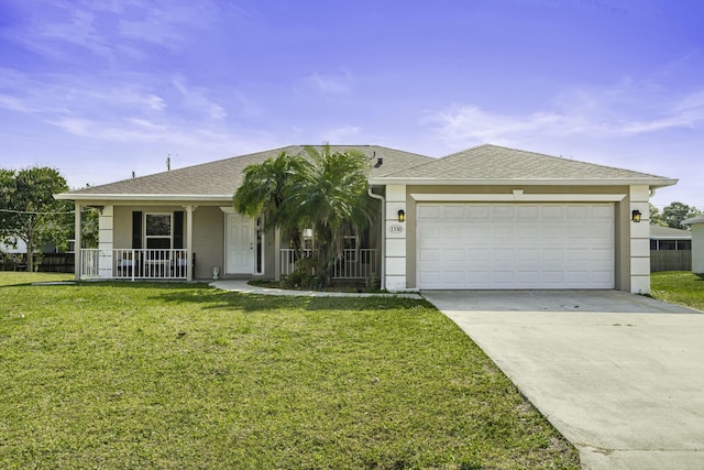 single story home with a garage, covered porch, and a front lawn