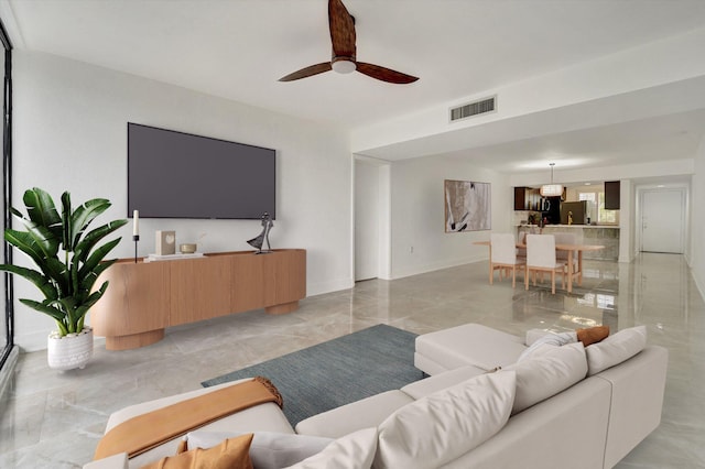 living room with ceiling fan