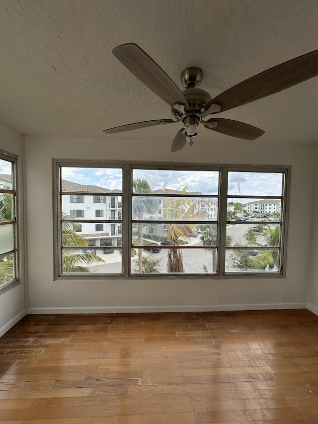 unfurnished sunroom featuring a healthy amount of sunlight