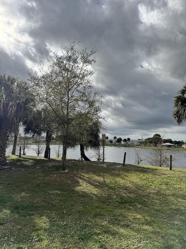 view of yard with a water view