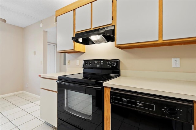 kitchen featuring black appliances, under cabinet range hood, white cabinetry, and light countertops