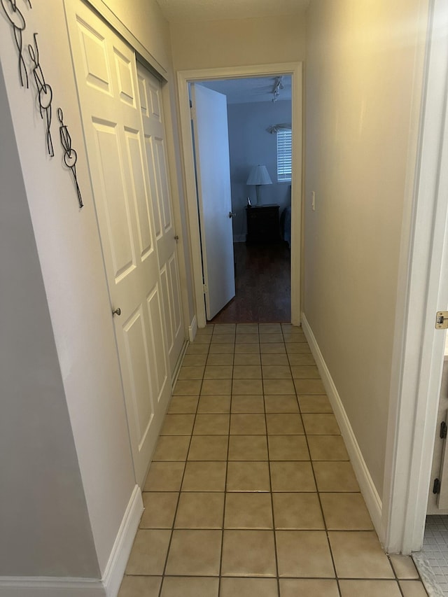 3482 Amalfi Dr, West Palm Beach, FL 33417 - hall with light tile patterned flooring