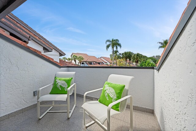 view of patio with a balcony