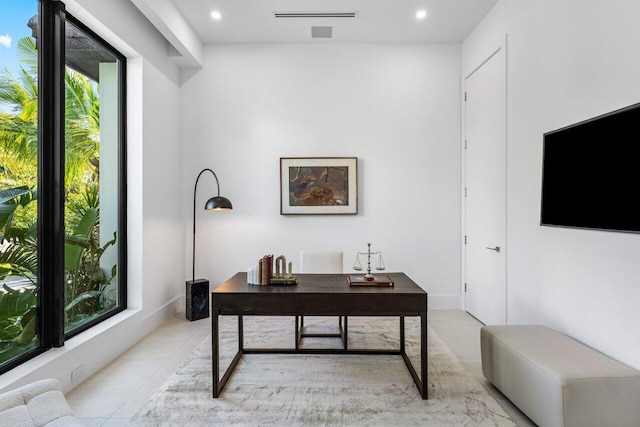 office space featuring light tile patterned flooring and recessed lighting