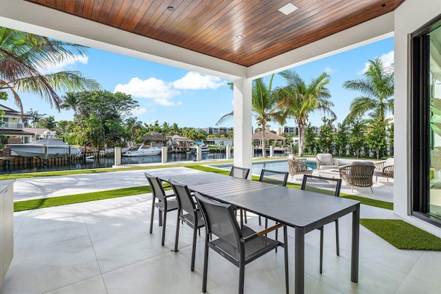 view of patio / terrace with a water view