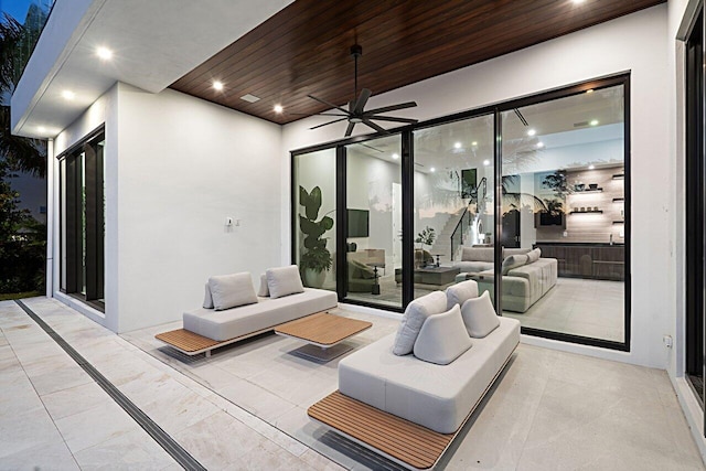 view of patio featuring outdoor lounge area and a ceiling fan