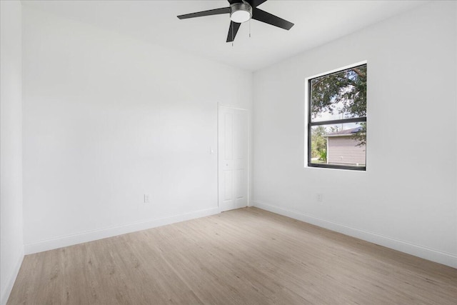604 Lake Ave, Lehigh Acres, FL 33972 - unfurnished room featuring ceiling fan and light hardwood / wood-style floors