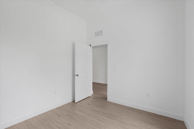 604 Lake Ave, Lehigh Acres, FL 33972 - empty room featuring light hardwood / wood-style floors