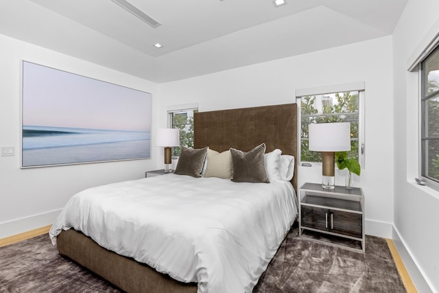 bedroom featuring dark hardwood / wood-style floors