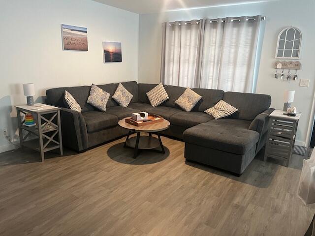 living area featuring wood finished floors