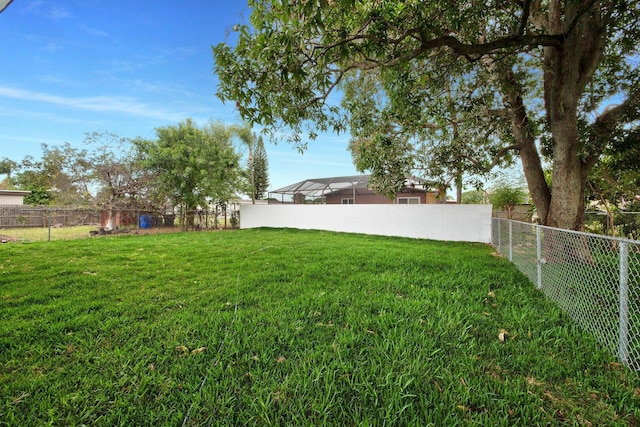 view of yard featuring a fenced backyard