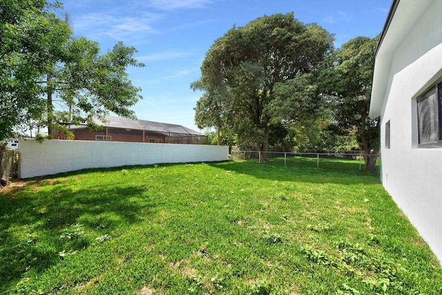 view of yard featuring a fenced backyard