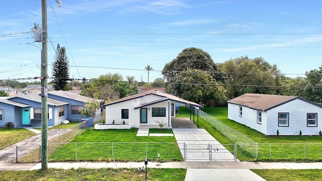 bungalow-style home featuring driveway, a fenced front yard, a gate, a front yard, and stucco siding