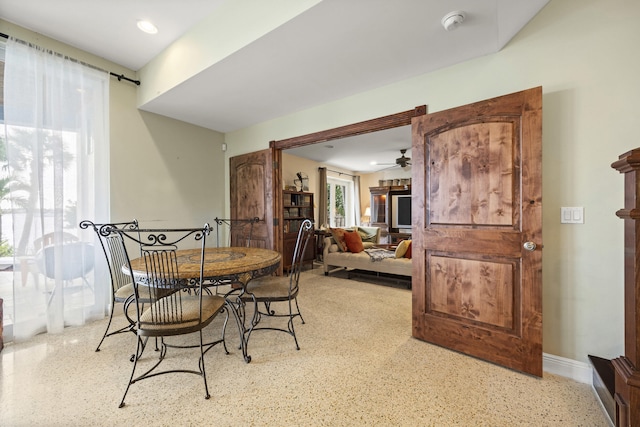 dining room with ceiling fan