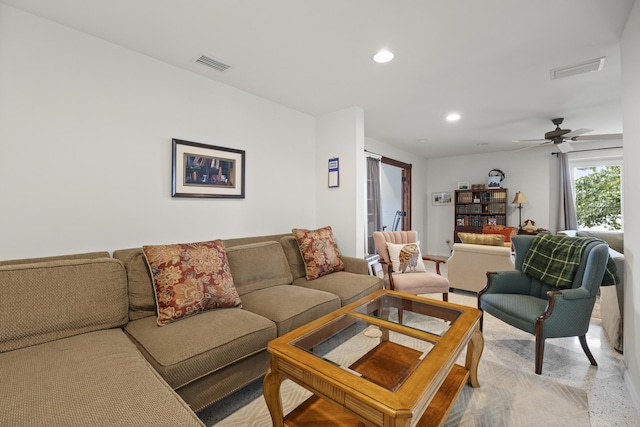 living room with ceiling fan