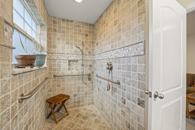 bathroom featuring tiled shower