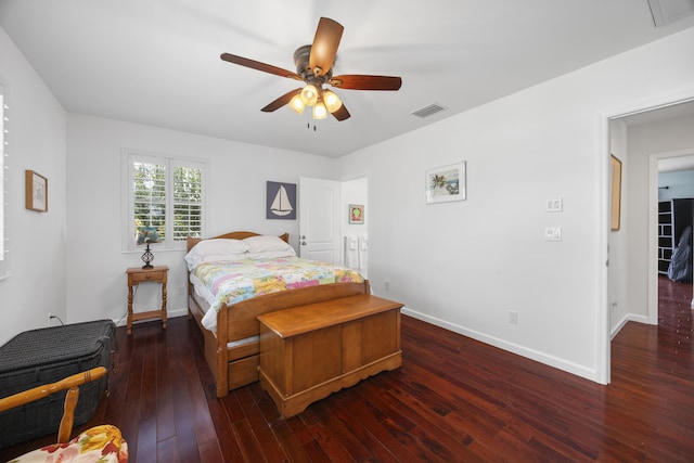 bedroom featuring ceiling fan and dark wood-type flooring