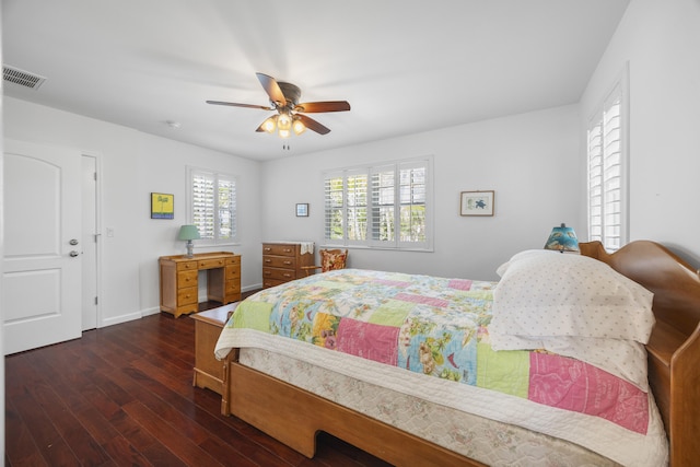 bedroom featuring dark hardwood / wood-style floors and ceiling fan