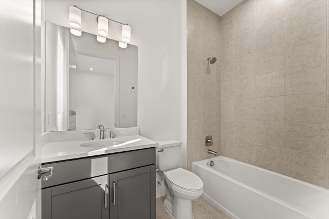 bathroom with tile patterned flooring, shower / tub combination, vanity, and toilet