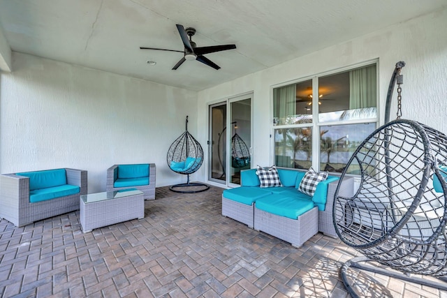 view of patio / terrace featuring ceiling fan and outdoor lounge area